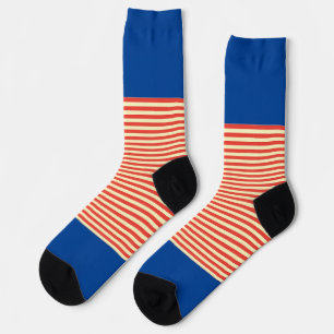 Orangefarbene Streifen auf blau Socken