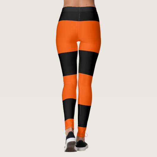 Orangefarbene Streifen Leggings (Rückseite)