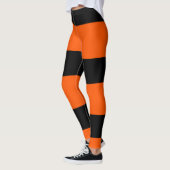 Orangefarbene Streifen Leggings (Links)