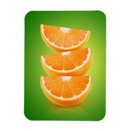 Orangefarbene Stücke auf grün Magnet
