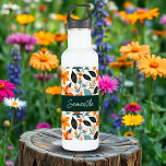 Orangefarbene und blaue Folien und Blume Personali Edelstahlflasche<br><div class="desc">Orangefarbene Blume,  blaues und dunkelgrünes Blattwerk,  personalisierte Wasserflasche.</div>
