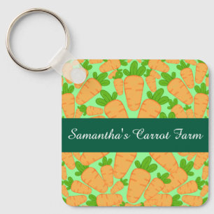 Orangefarbene und grüne Karotten Schlüsselanhänger