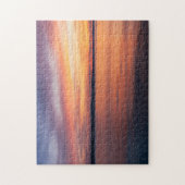 Orangefarbene und Lila Sonnenuntergangswolken über Puzzle (Vertikal)