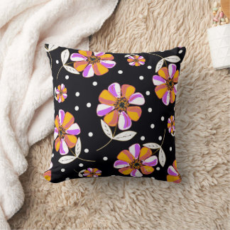 Orangefarbene und Lila Stiefmütterchen mit Polka D Kissen