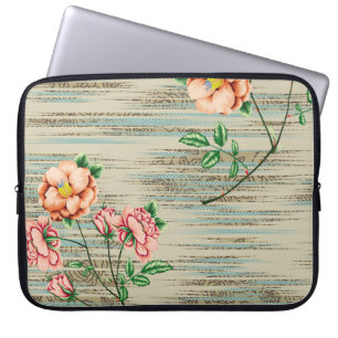 Orangefarbene und rosa Vintage Blume mit grünen Bl Laptopschutzhülle