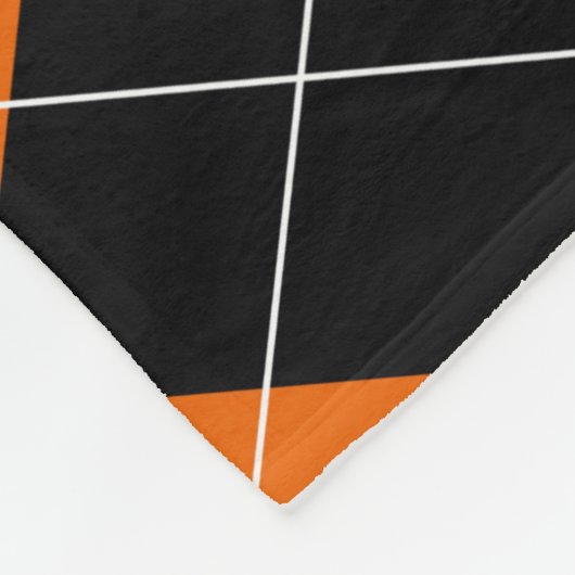 Orangefarbene und schwarze Raute Fleece Blanket (Ecke)