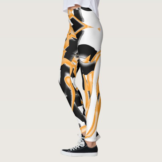 Orangefarbene und schwarze Schrotte oder Bänder we Leggings (Links)