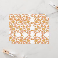 orangefarbene und weiße Tapeten mit Blumenmotiv