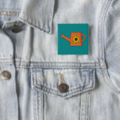 Orangefarbene Wasserdose mit Sonnenblumen Button (Beispiel)