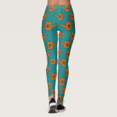 Orangefarbene Wasserdose mit Sonnenblumen Leggings (Rückseite)