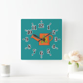 Orangefarbene Wasserdose mit Sonnenblumen Quadratische Wanduhr (Zuhause)