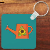 Orangefarbene Wasserdose mit Sonnenblumen Schlüsselanhänger (Rückseite)