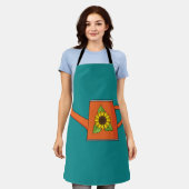 Orangefarbene Wasserdose mit Sonnenblumen Schürze (Getragen)