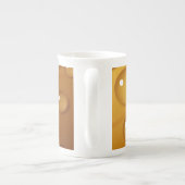 Orangefarbene Wassertropfengewebe Porzellantasse (Rückseite)