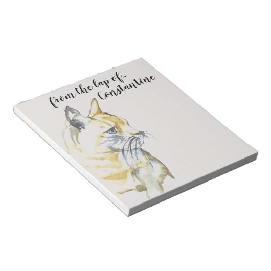 Orangefarbene weiße Tablette aus der Runde Notizblock (angewinkelt)