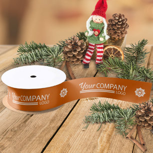 Orangefarbene weiße Werbelogos Schneeflocken Weihn Ripsband