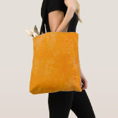 Orangefarbene Zementoberfläche, abstraktes Muster Tasche (Von Nahem)