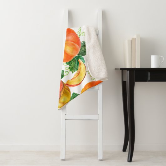 Orangefarbener Kürbis auf weißem Hintergrund. Naht Sherpadecke (Beispiel)