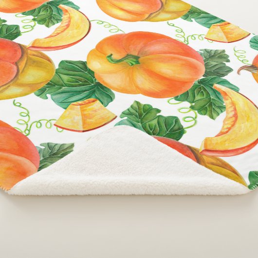 Orangefarbener Kürbis auf weißem Hintergrund. Naht Sherpadecke (3/4)