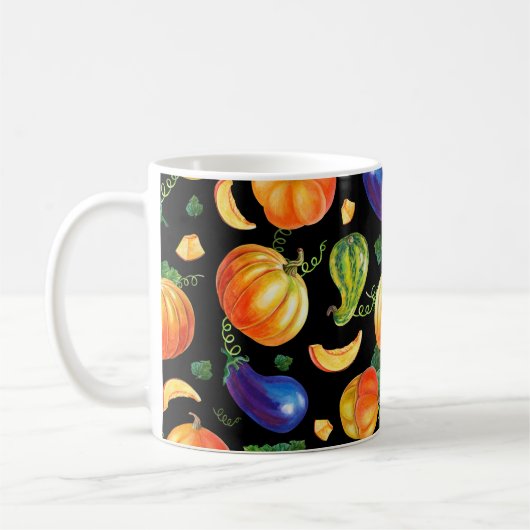 Orangefarbener Kürbis, gestreifter Zucchini, blaue Kaffeetasse (Links)
