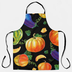 Orangefarbener Kürbis, gestreifter Zucchini, blaue Schürze