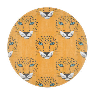Orangefarbener Leopardenkopf, nahtloses Muster. Schneidebrett