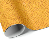 Orangefarbener Pullover, texturierter Hintergrund. Geschenkpapier (Rolleneckpunkt)