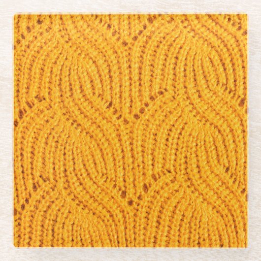 Orangefarbener Pullover, texturierter Hintergrund. Glasuntersetzer (Vorderseite)