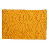 Orangefarbener Pullover, texturierter Hintergrund. Kissenbezug (Rückseite)