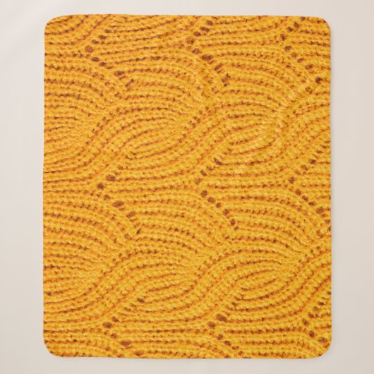 Orangefarbener Pullover, texturierter Hintergrund. Sherpadecke (Vorderseite)