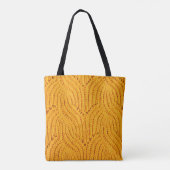 Orangefarbener Pullover, texturierter Hintergrund. Tasche (Rückseite)