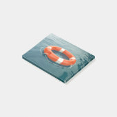 Orangefarbener Rettungsring im Ozean Post-it Klebezettel (angewinkelt)