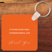 Orangefarbener Schlüsselanhänger der Blume mit Mon (Rückseite)