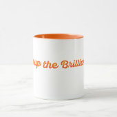 Orangefarbener Schriftart-Design mit motivierender Tasse (Zentrum)