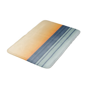 Orangefarbener Sonnenuntergang über den Blauen Oze Badematte