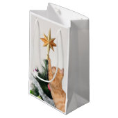 Orangefarbener Tisch und Weihnachtsstern Kleine Geschenktüte (Vorderseite Schrägansicht)