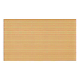 orangefarbener und gelber Hintergrund mit kleinen  Namenschild