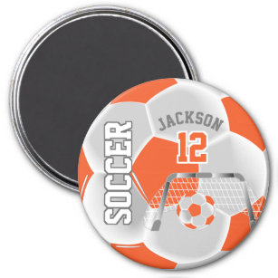 Orangefarbener und weißer Fußballball Magnet