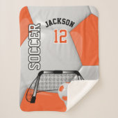 Orangefarbener und weißer Fußballball mit DIY-Text Sherpadecke (Vorderseite)