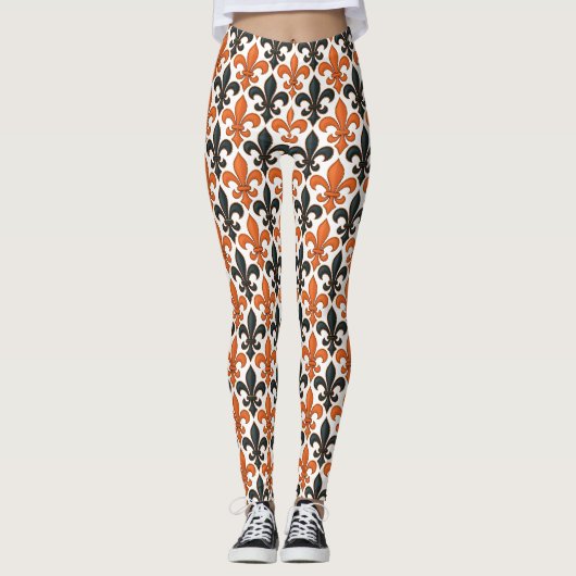 Orangefarbenes Fleur-de-lis-Muster Leggings (Vorderseite)