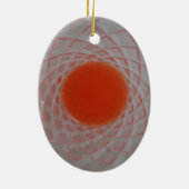 Orangefarbenes Getränk in Kristallglas Keramikornament (Hinten)