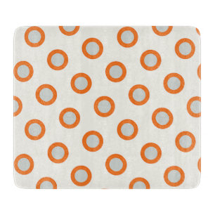 Orangefarbenes Kreiseldrehpunktdesign Schneidebrett