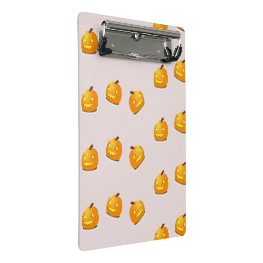 Orangefarbenes Kürbiskopfmuster Mini Klemmbrett (Schrägansicht)