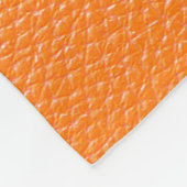 Orangefarbenes Ledermuster, Textur aus Hinterleder Fleecedecke (Ecke)