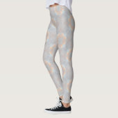 Orangefarbenes Muster mit/grau und blau Leggings (Links)