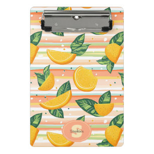 Orangefarbenes Muster mit grünen Blätter auf Paste Mini Klemmbrett