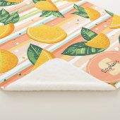 Orangefarbenes Muster mit grünen Blätter auf Paste Sherpadecke (3/4)