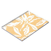 Orangefarbenes nahtloses Muster mit gestreiftem Rü Notizblock (Linke Seite)