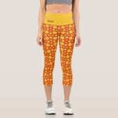 Orangefarbenes Quadrat- und Dreiecksgeflecht-naive Capri Leggings (Vorderseite)