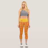 Orangefarbenes Quadrat- und Dreiecksgeflecht-naive Capri Leggings